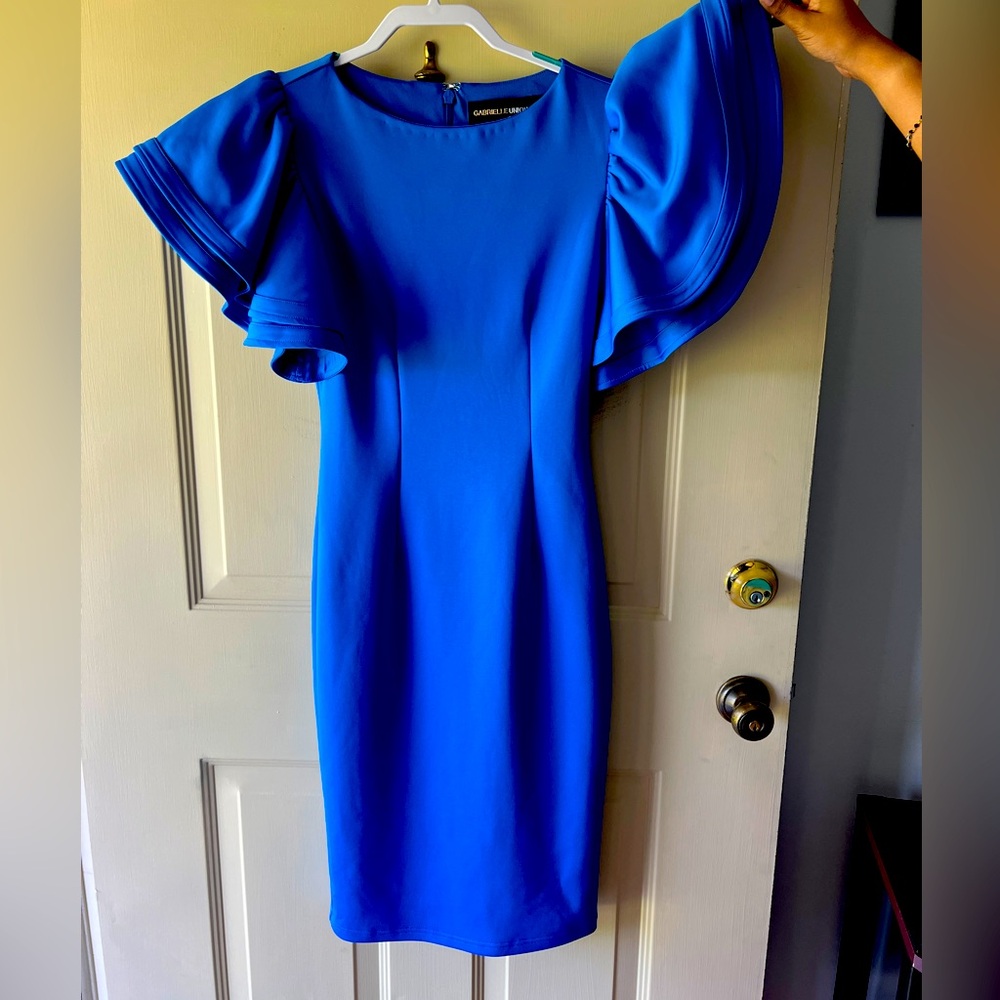 Size 2 dress. 60 inches in length. Beautiful dress. Worn once on stage.